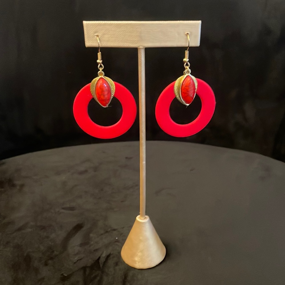 Brand new red dangly earrings; 2.5 inches long